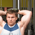 Triceps - tricepsové tlaky s jednoručkou obouruč za hlavou v sedě